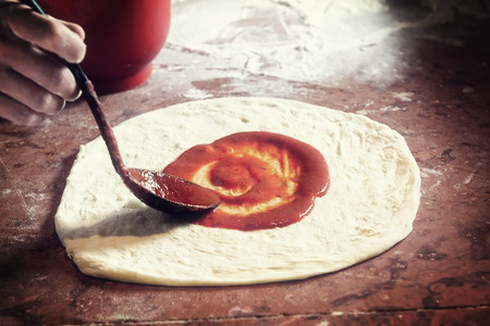 seven-minute-sales-minute-podcast-anchovies - photo of someone making pizza