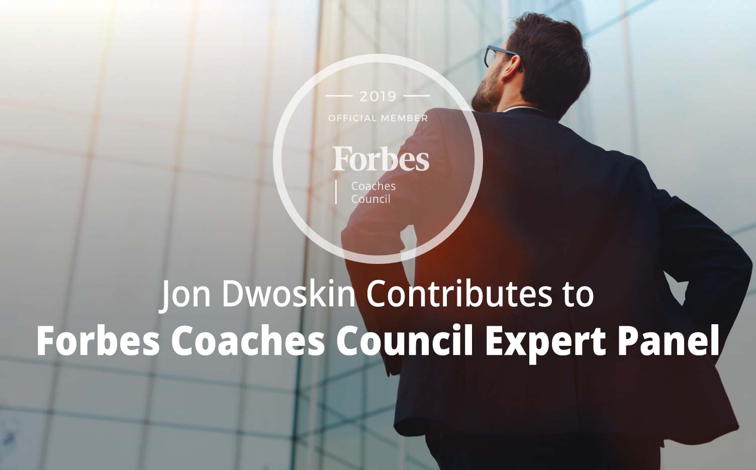 Forbes Coaches Council Expert Panel: Try These 11 Coach-Recommended Strategies To Break Your Negative Thought Patterns - Businessman looking up at building